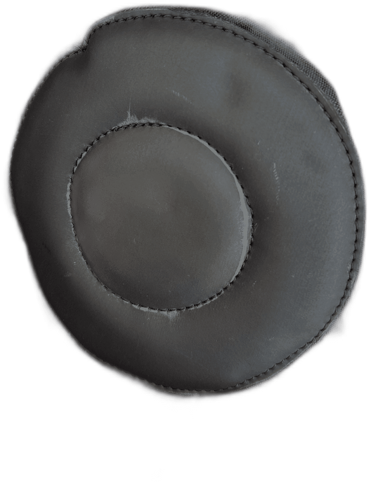 Interior of the Zantaf hood showing a padded ring-shaped ear cup and smooth satin lining